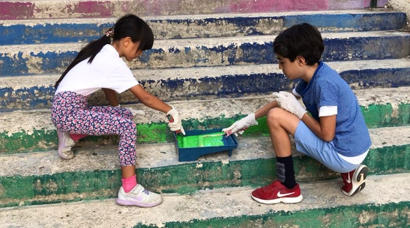 children painting stairway stairs